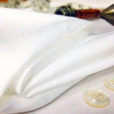 Sandhurst plain white solid fabric