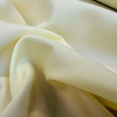 Monarch plain primrose solid fabric